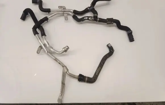 Volkswagen Touareg III Engine coolant pipe/hose 4M0122449AC 4M0319350AE