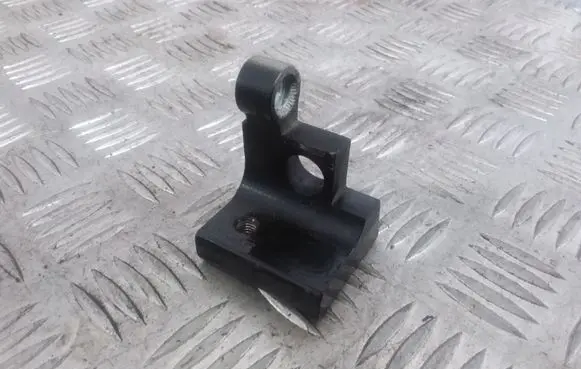 Rear door upper hinge