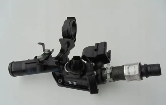 Thermostat/thermostat housing