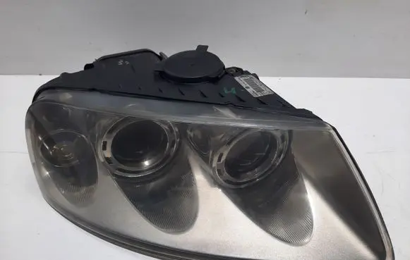 Volkswagen Touareg I Headlight/headlamp 7L6941016BK