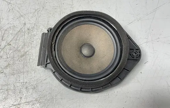 Opel Astra J Front door speaker 13257500