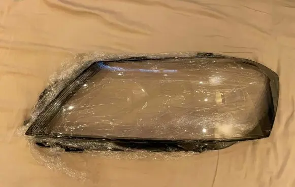 Volkswagen PASSAT B7 Headlight lense 