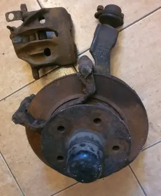 Front wheel hub spindle knuckle