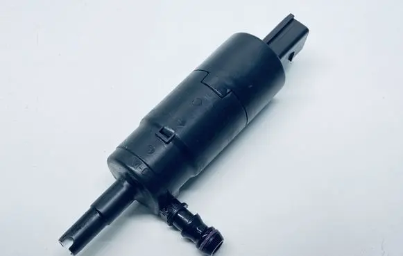 Volkswagen Touareg II Headlight washer pump 3B7955681