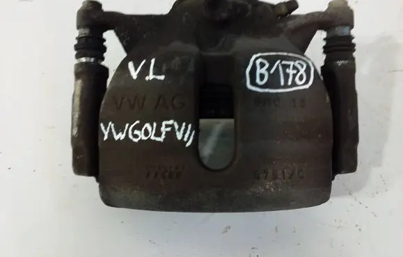 Volkswagen Golf VII Front brake caliper