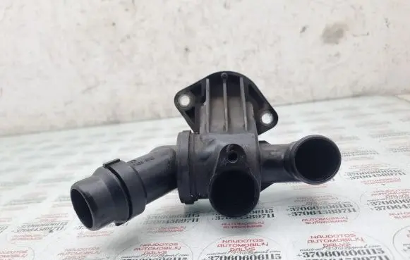 Thermostat/thermostat housing