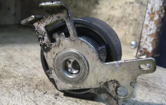 Timing belt tensioner pulley