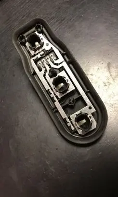 Tail light bulb cover holder
