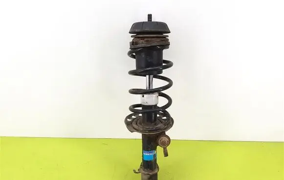 Opel Corsa C Front shock absorber with coil spring 131500290381