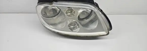 Volkswagen Touran I Headlight/headlamp 0301205202 1T0941006