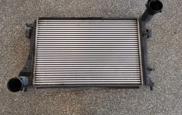 Volkswagen Golf V Intercooler radiator 1K0145803H