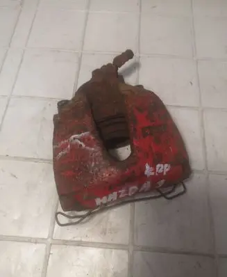 Mazda 3 I Front brake caliper
