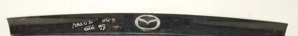Trunk door license plate light bar