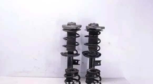 Front shock absorber with coil spring