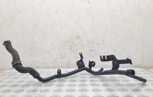 Volkswagen Golf IV Engine coolant pipe/hose 038121065A