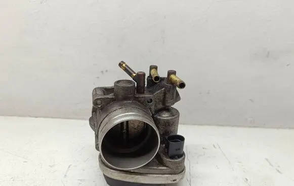 Volkswagen Touran I Throttle valve 06A133062AT 07345I A2C53093430