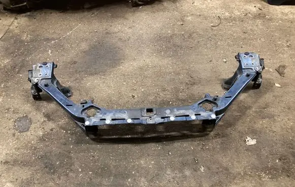 Top upper radiator support slam panel