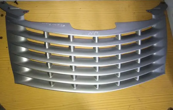 Chrysler PT Cruiser Front bumper upper radiator grill 27784