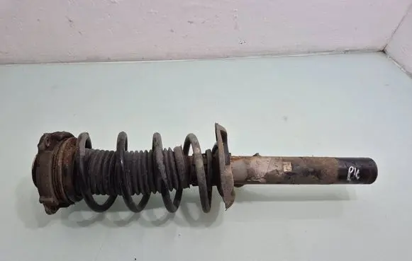 Seat Leon (1P) Front shock absorber with coil spring 