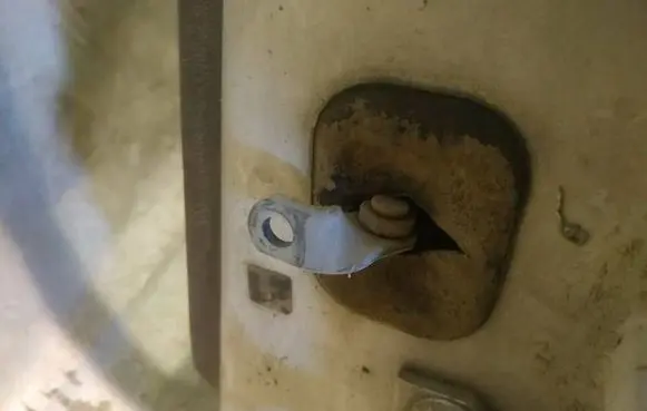 Rear door check strap stopper