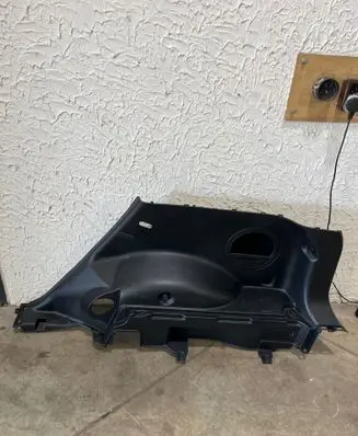 Trunk/boot lower side trim panel