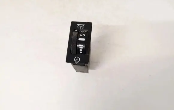 Panel lighting control switch