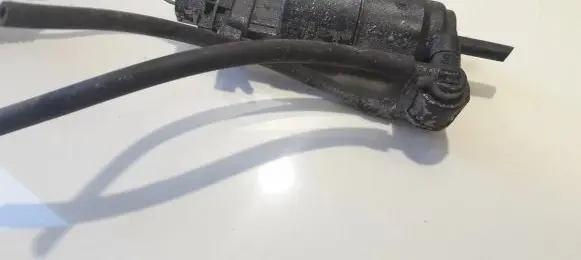 Renault Megane I Windscreen/windshield washer pump 7700821782