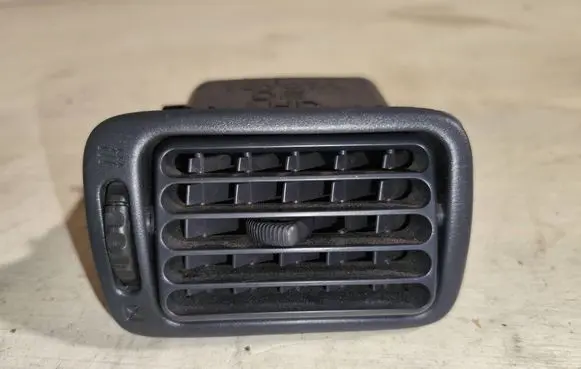 Toyota Corolla E110 Dash center air vent grill 5565012230
