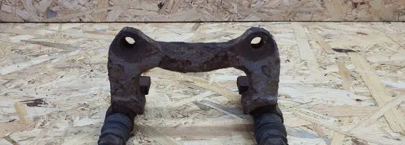 Volkswagen PASSAT B5 Brake caliper pad carrier rear 