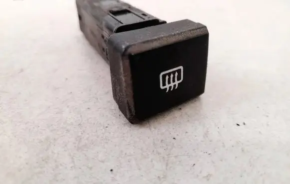 KIA Carens I Windscreen/window heater switch
