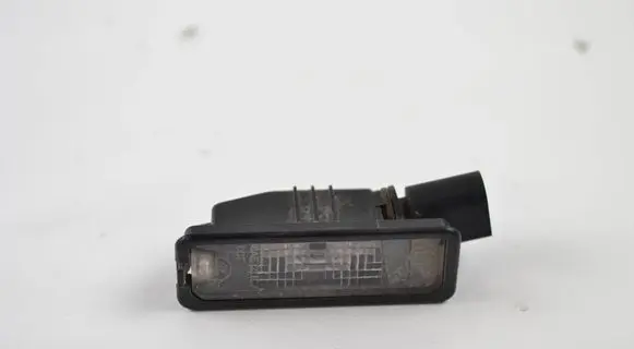 Volkswagen Golf VII Number plate light 1K8943021