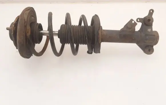 Nissan Primera Front shock absorber with coil spring