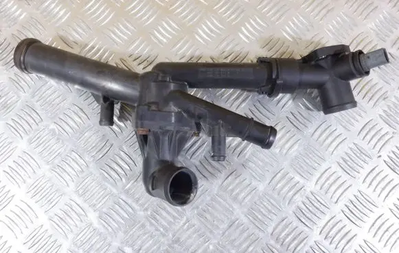 Volkswagen Touareg II Engine coolant pipe/hose 03H121026A