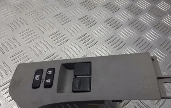 Toyota Yaris Front door window switch trim 74232-00110