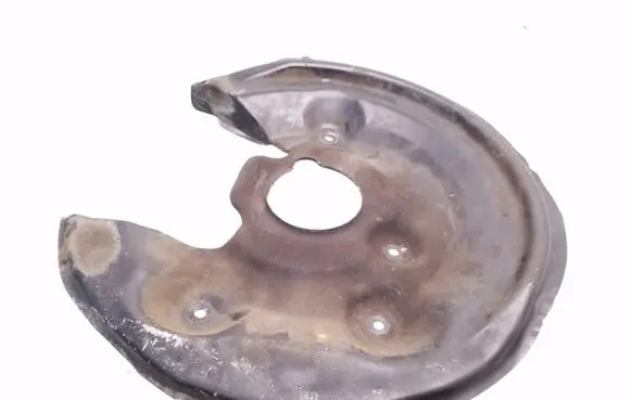 Volkswagen PASSAT B7 Rear brake disc plate dust cover 5N0615611C