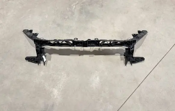 Top upper radiator support slam panel