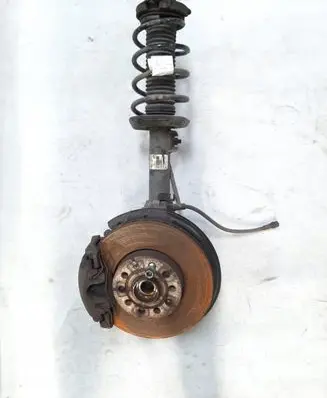 Volkswagen Jetta VI Front wheel hub spindle knuckle 5C0413031DK