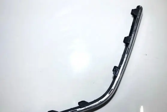 Rear bumper trim bar molding