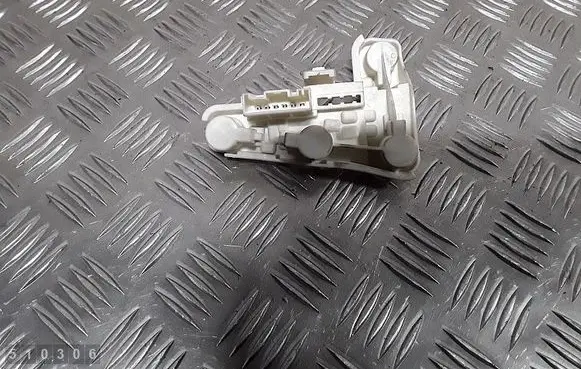 Tail light bulb cover holder