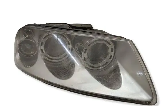 Volkswagen Touareg I Headlight/headlamp 7L6941016BK