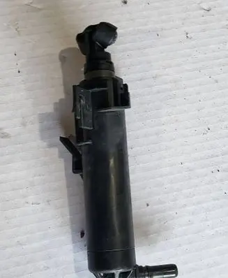 Audi A4 S4 B8 8K Headlight washer spray nozzle 8K0955101D
