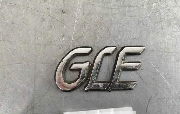 Volvo 740 Rear door emblem/model letters 1321529 1329015