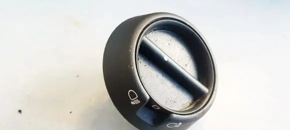 Headlight level height control switch