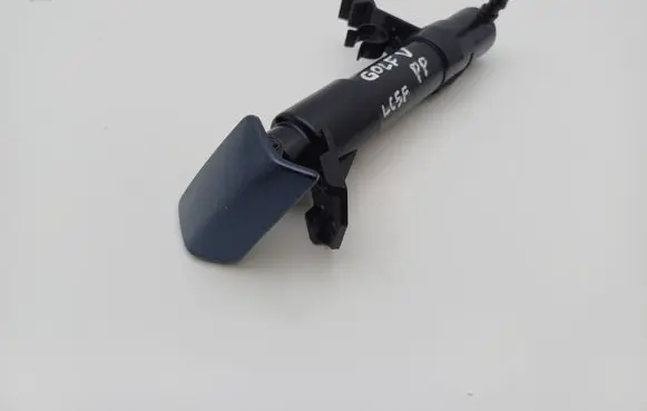 Volkswagen Golf V Headlight washer spray nozzle