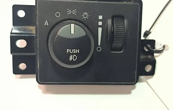 Headlight level height control switch