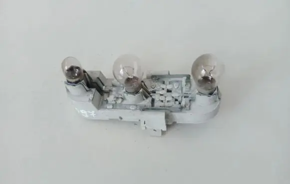 Volvo S40, V40 Tail light bulb cover holder