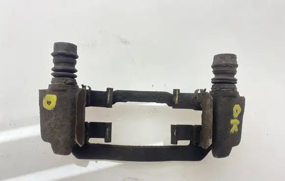 Subaru Legacy Brake caliper pad carrier rear 