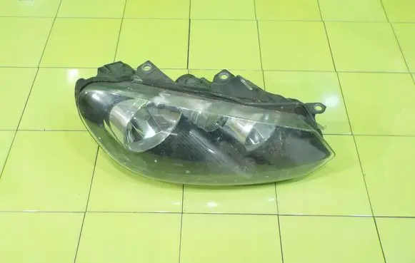 Volkswagen Golf VI Headlight/headlamp 1EG009901