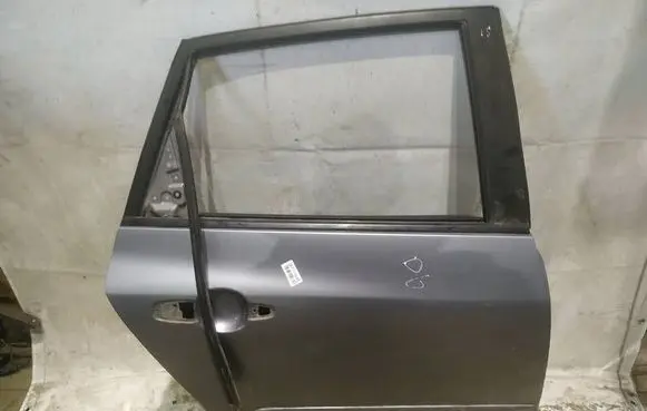 Mazda 3 I Rear door PILKOS