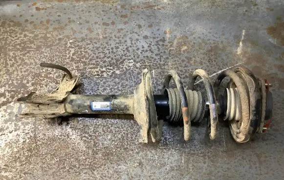 Nissan X-Trail T30 Front shock absorber with coil spring 54303EQ000 2A19822B